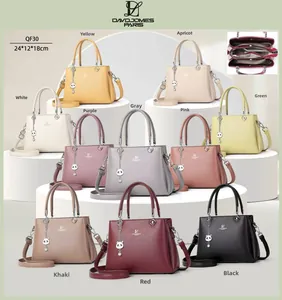 Three-compartment structure and inner lining of a textured faux leather handbag
