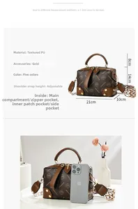 Detailed view of Boston bag showing internal compartments, size 21x14x10cm and gold hardware