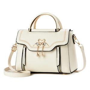 Chic beige crossbody handbag featuring golden double swan metal buckle with pearl tassels