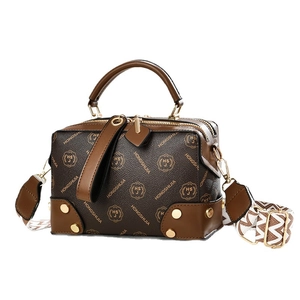 Vintage Boston bag with monogram pattern and adjustable geometric wide strap in brown