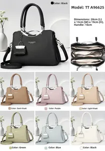 Detail view of large capacity lychee pattern handbag with 3-compartment interior layout