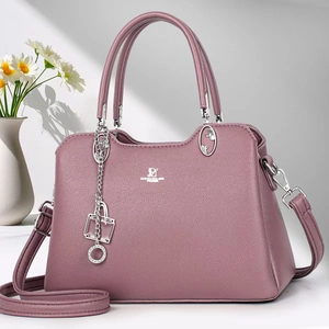 Elegant mauve pebble leather shoulder bag with silver hardware by David Jones Paris
