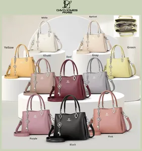 Detailed interior compartment and multiple color options for the stylish crossbody bag