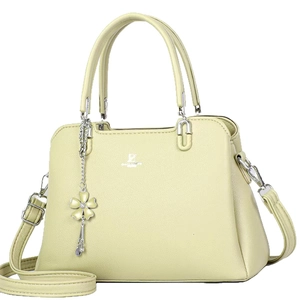 Elegant cream green tote bag with litchi texture and floral charm on a white background
