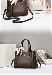 Detail of dark brown lychee textured PU leather tote bag with floral scarf accessory