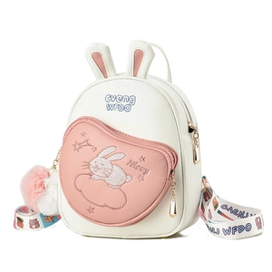 Cute bunny-shaped crossbody bag with rabbit ears and pink heart-shaped front pocket