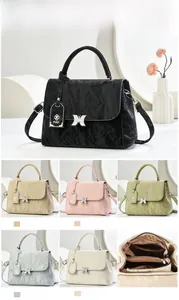 Detailed size specifications for large capacity women's bag with butterfly buckle