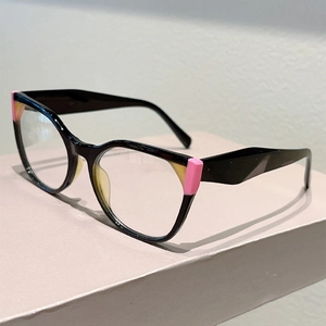 Chic black acetate frames with pink and yellow patchwork accents and anti-blue light lenses