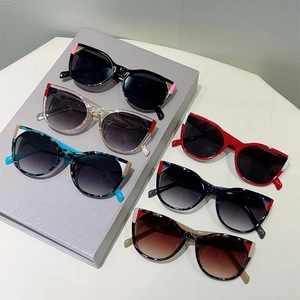 Fashionable oversized cat-eye sunglasses with colorful frames and gradient lenses