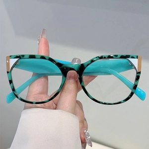 Stylish oversized blue light blocking glasses with green leopard print and gold accents