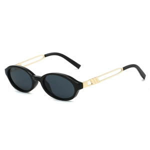 Vintage oval Y2K sunglasses with black frames and gold hollow geometric metal temples