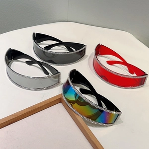 Close-up of frameless rimless sunglasses with rhinestone trim in four assorted colors
