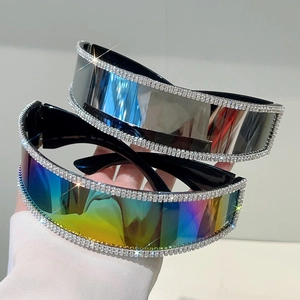 Detail of rimless futuristic sunglasses with rhinestone trim and mirrored lenses