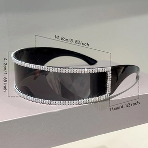 Macro detail of oversized rimless rhinestone sunglasses showing frame and leg dimensions