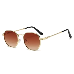 Retro hexagonal gold metal sunglasses with gradient brown lenses and textured temples