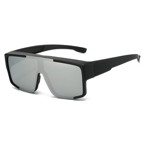 Side view of black wrap-around cycling sunglasses with silver reflective lenses
