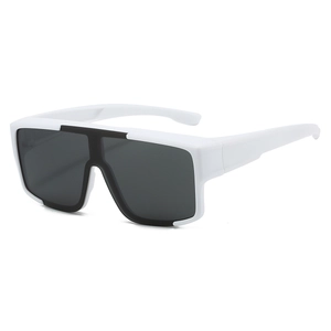 Detail view of white wide-frame sports sunglasses with dark lenses at a 45-degree angle
