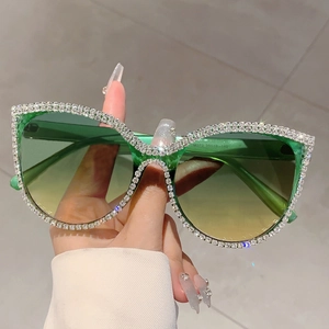 Cat eye oversized sunglasses with crystal rhinestones and green-yellow gradient lenses