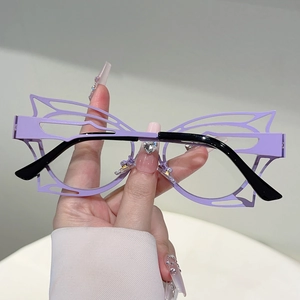 Detail of lavender butterfly frame glasses with cut-out wings and black temples