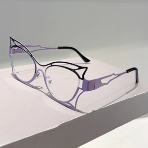 Detail view of purple butterfly frame glasses with black cutout accents on grey pedestal