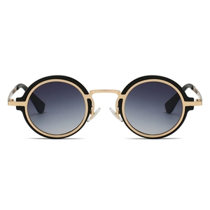 Detailed front view of round steampunk sunglasses with gold metal bridge and black frame