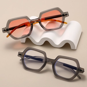 Vintage hexagonal sunglasses with orange gradient lenses and clear blue light blocking glasses