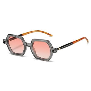 Detail of square frame sunglasses with pink gradient lenses and tortoiseshell temples