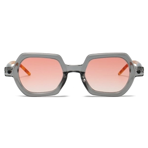 Detail of translucent hexagonal sunglasses with gradient lenses and tortoiseshell tips