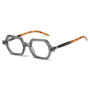 Close-up of hexagonal transparent grey frame with retro amber tortoiseshell temples