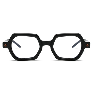 Detail of square black glasses frame with hexagon geometric rims and brown temple accents