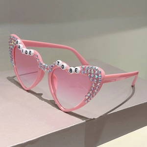 Detail of pink heart sunglasses with Bride To Be letter beads and iridescent rhinestones