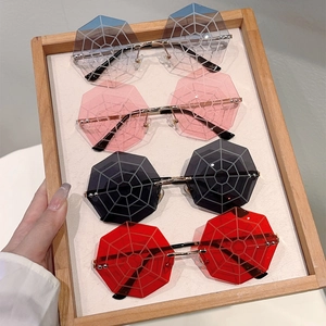 Unique octagonal rimless spider web sunglasses in blue, pink, gray, and red colors