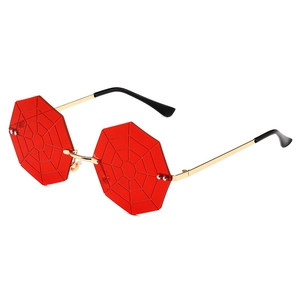 Unique red octagonal spider web sunglasses with rimless lenses and gold metal frame