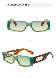 Detail of green square frame sunglasses with golden leopard emblem on tortoise temples