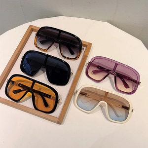 Five assorted colors of oversized shield sunglasses in retro acetate frame design