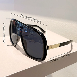 Detailed dimensions of oversized wrap sunglasses with black frame and gold metal accents