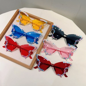 Butterfly party sunglasses in six candy colors with Birthday Queen bead decorations