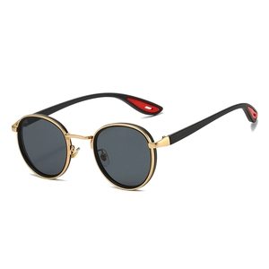 Men's round metal sunglasses with gold frame, dark lenses and red cutout temples