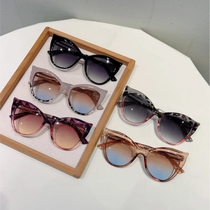 Collection of cat-eye sunglasses in various colors with luxury hollow temples design