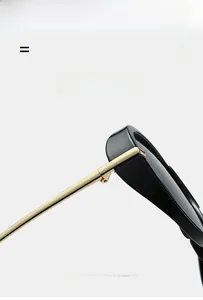 Detail of lightweight black aviator sunglasses with slim gold metal temples and high elasticity