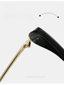 Detailed macro view of durable golden metal hinges on premium black acetate sunglasses
