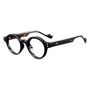 Retro round black blue light blocking glasses with tortoise shell temples on white background