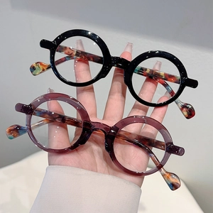 Retro round anti-blue light glasses with black and purple frames and tortoiseshell temples