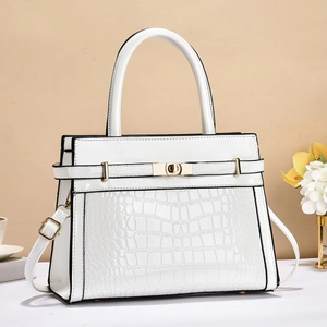 Elegant white crocodile embossed tote bag with glossy patent leather and gold metal clasp
