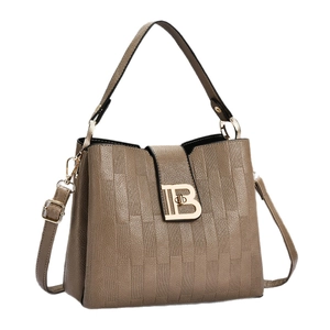 Taupe rectangle embossed tote bag with gold B-logo buckle and adjustable strap