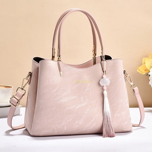 Pink marble texture handbag for women with floral tassel and adjustable shoulder strap