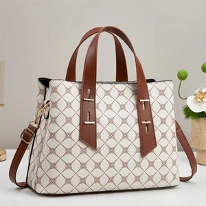 Minimalist beige tote bag with clover monogram pattern and adjustable shoulder strap