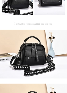 Detail of black textured leather bag with wide geometric pattern fabric strap