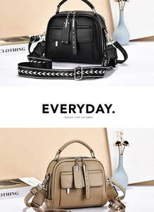 Detail of lychee pattern leather bags with stylish woven straps and zipper pockets