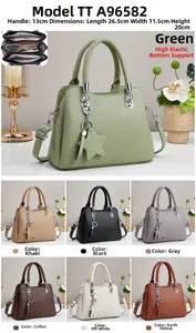 Crossbody bag with three-layer interior structure and star pendant detail in litchi leather